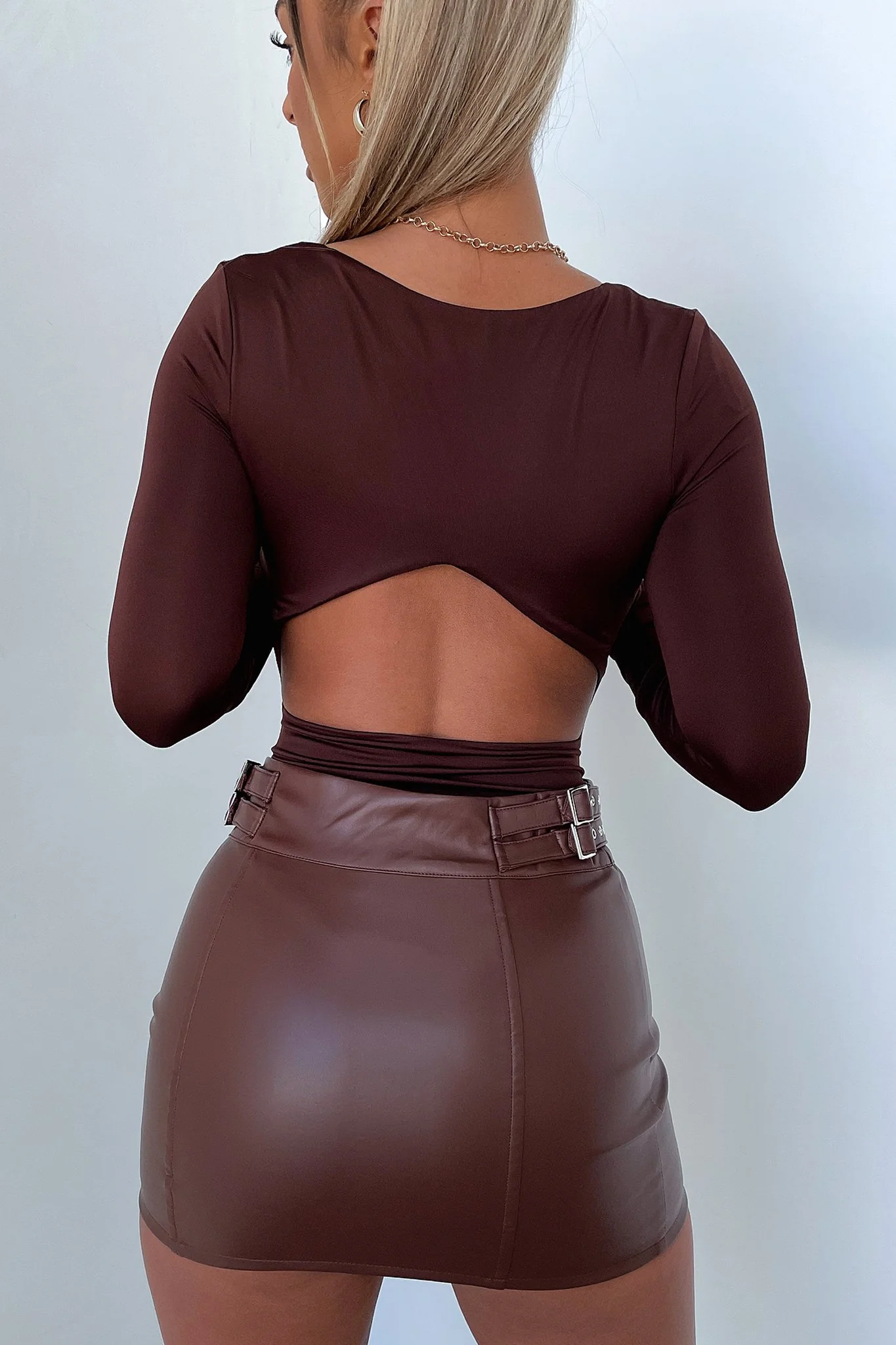 1140-cecilia-mini-skirt-brown-pu-1.webp