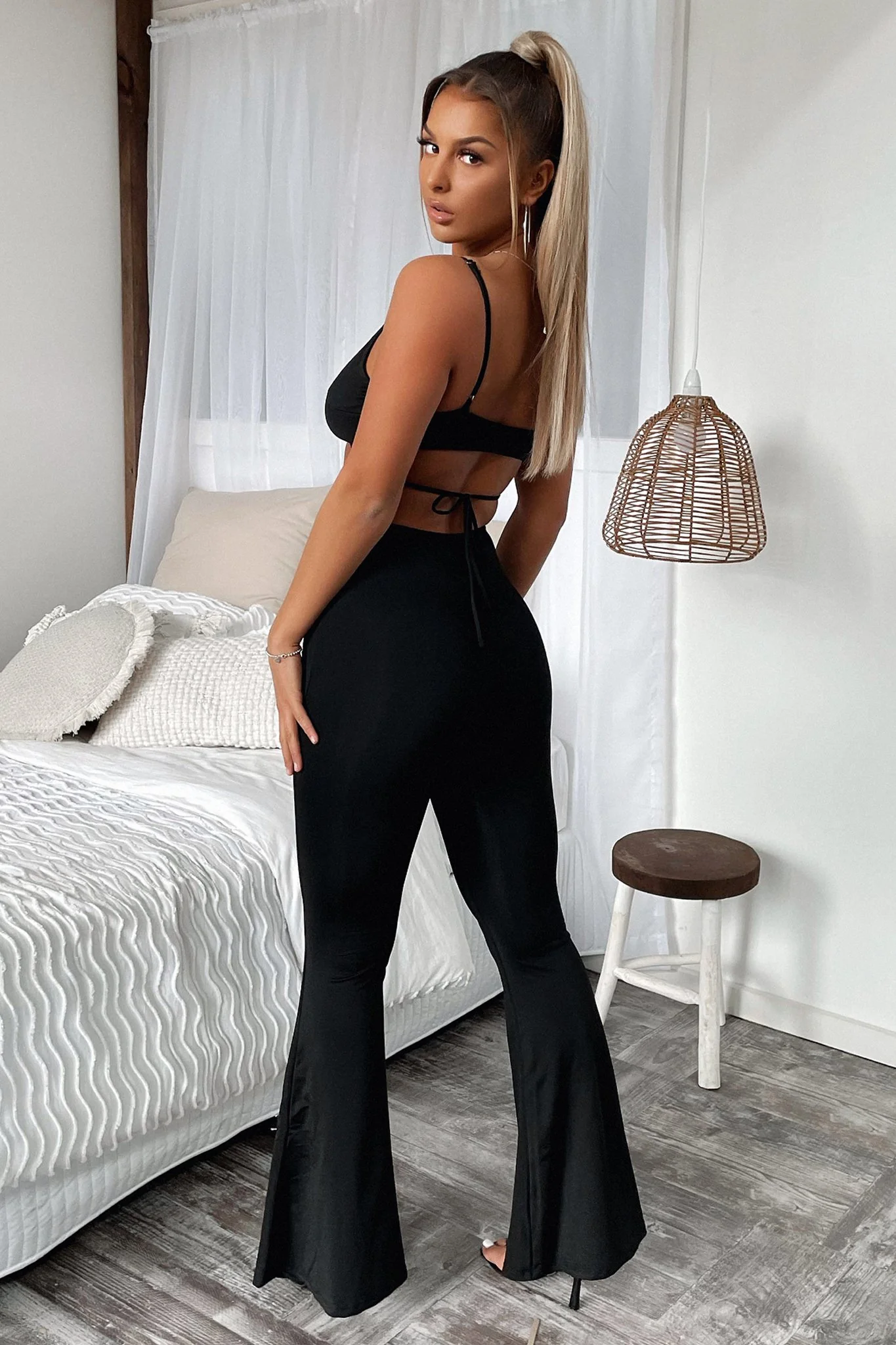19031-zoya-flare-pants-black-1.webp