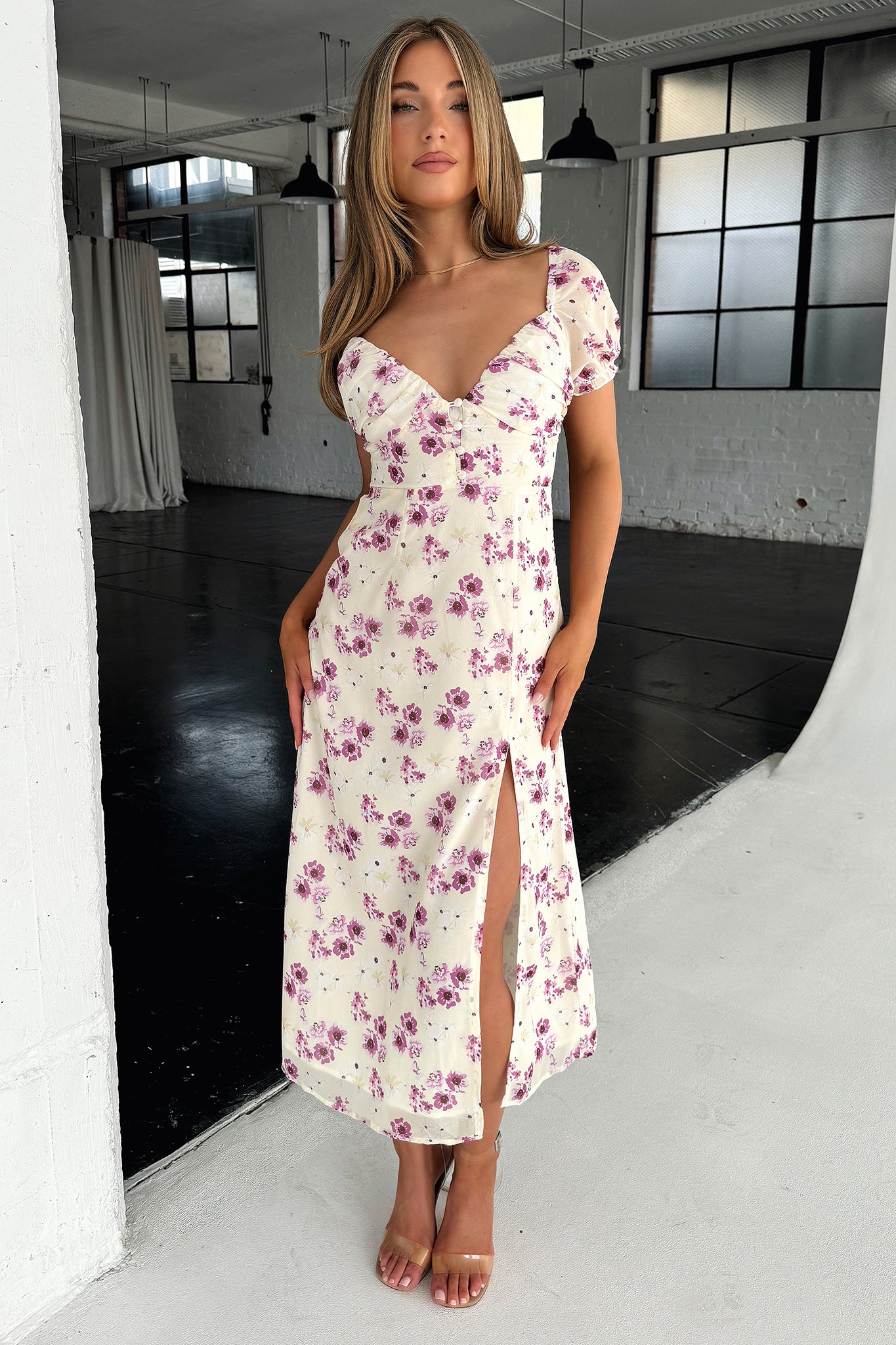 32653-solem-midi-dress-yellow-floral-1.webp