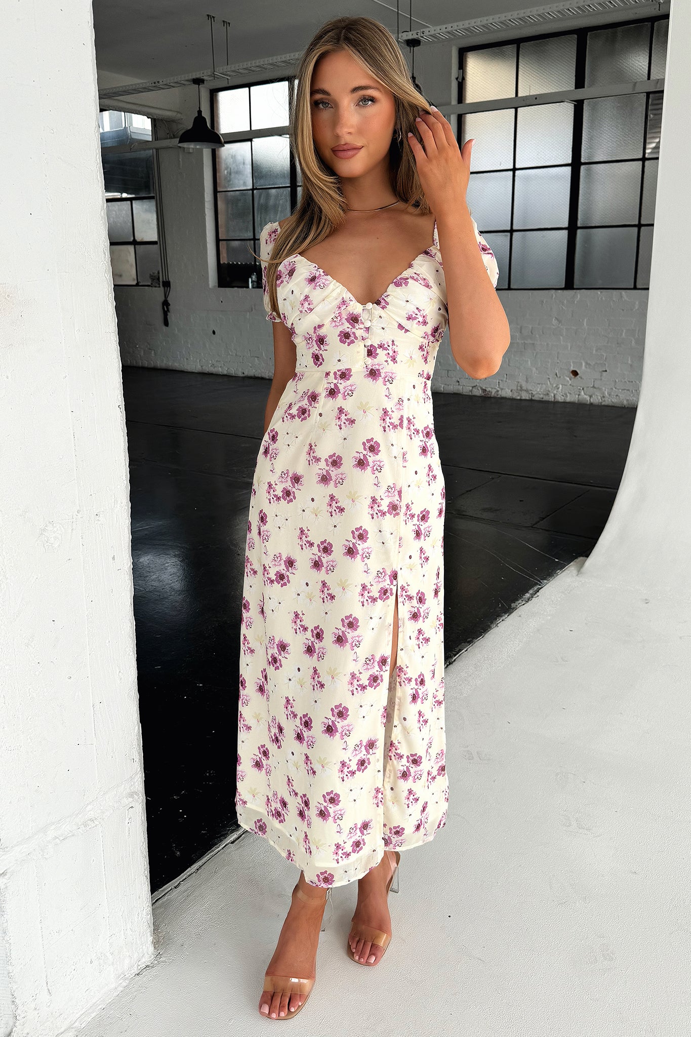 32653-solem-midi-dress-yellow-floral-1.webp