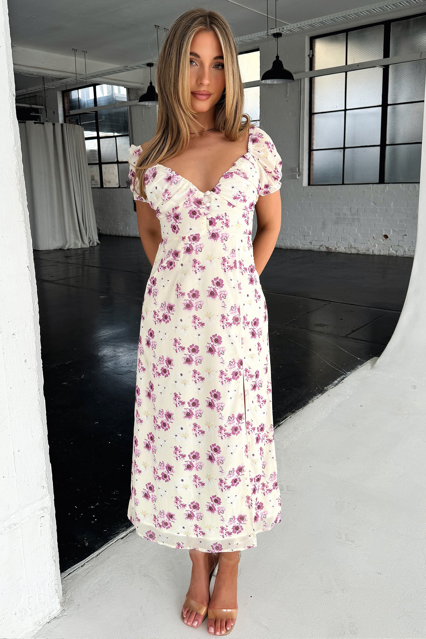 32653-solem-midi-dress-yellow-floral-1.webp