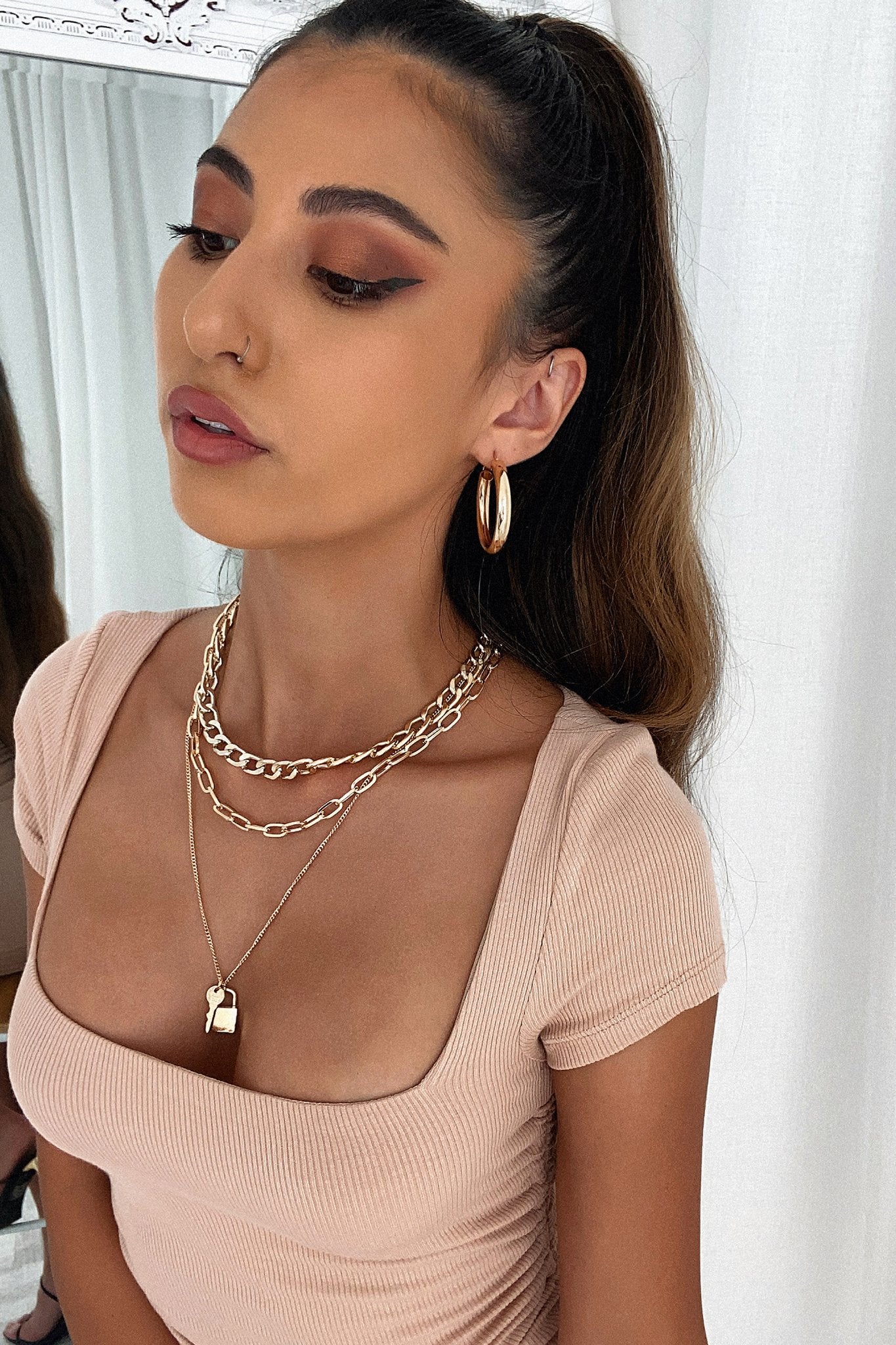 91-fendi-hoop-earrings-gold-1.webp