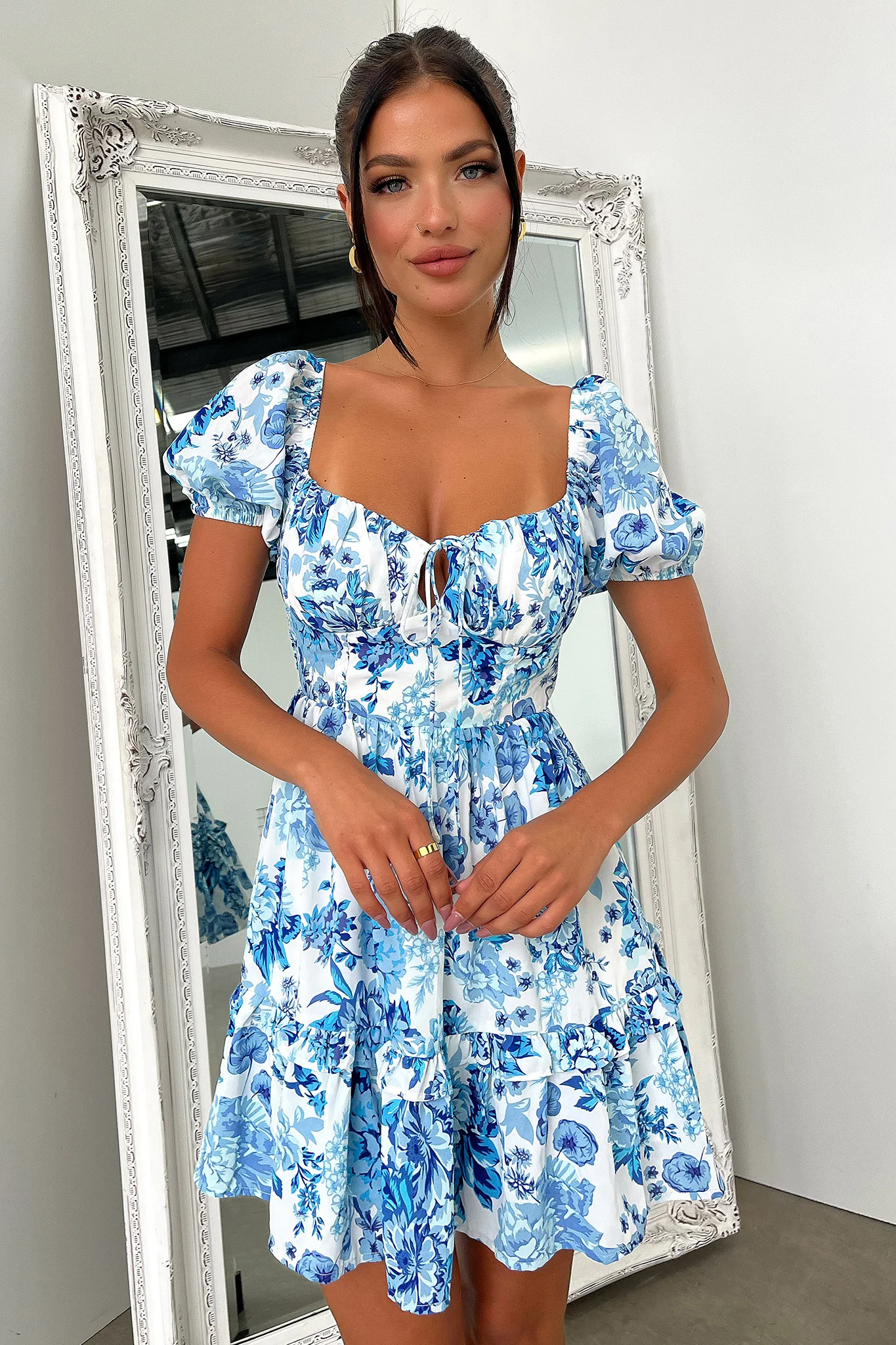 9904-taleah-puff-sleeve-mini-dress-blue-floral-1.webp